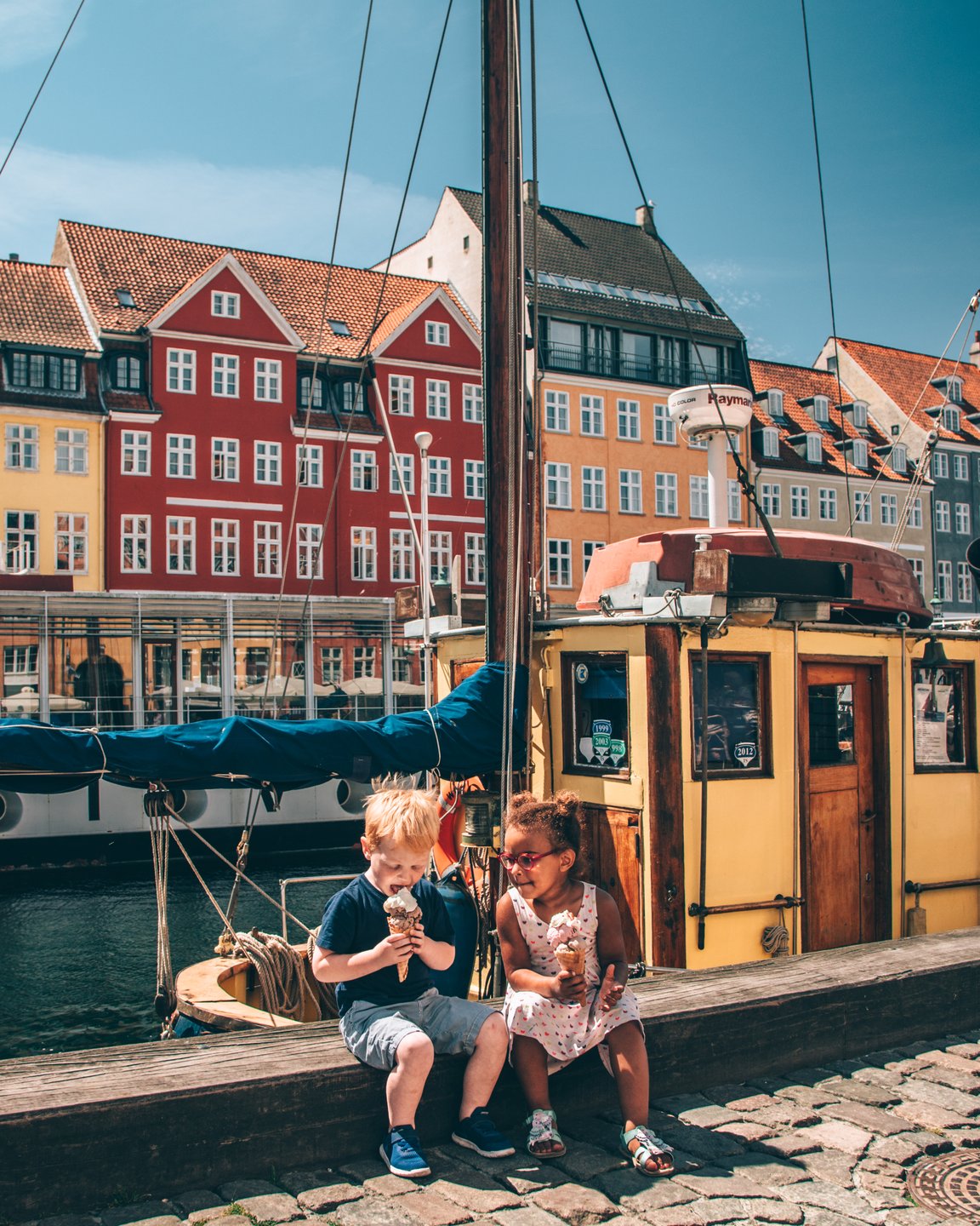 Kids eating ice cream in Copenhagen's iconic Nyhavn