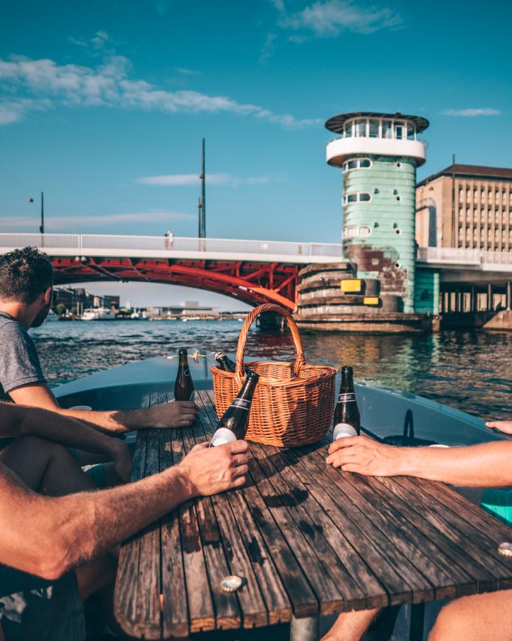 Have a picnic while cruising around in Copenhagen's harbour