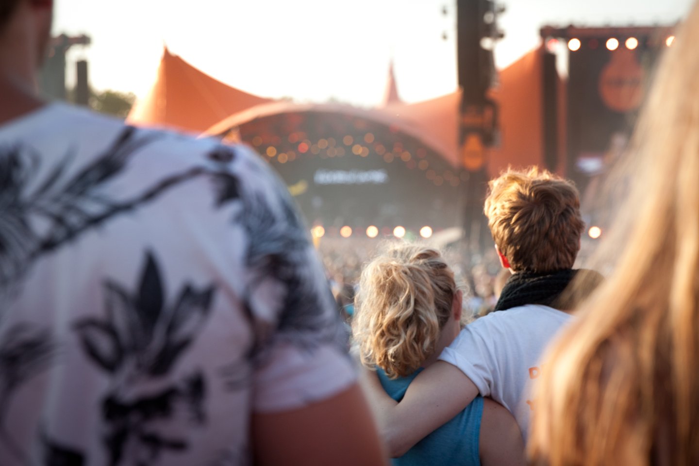 Couple in front of Orange Stage at Roskilde Festival