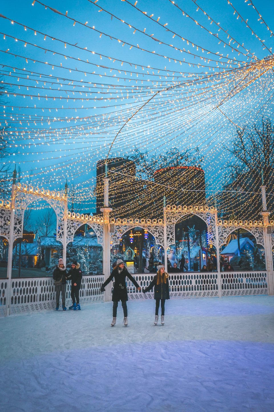 Ice skating in front of the magical Nimb Hotel in the iconic Tivoli Gardens