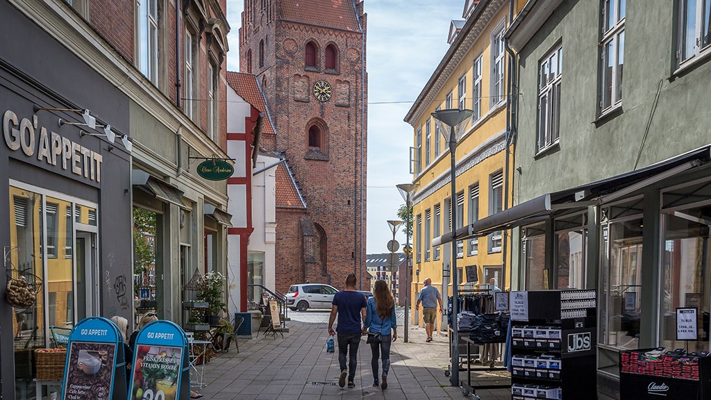 A couple strolling the streets of Næstved