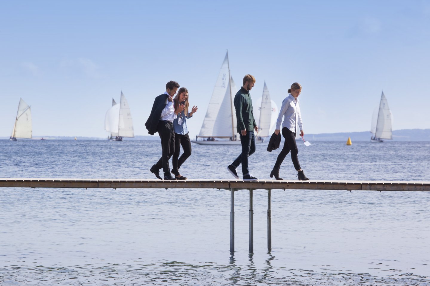 Business people walking on Aarhus infinite bridge