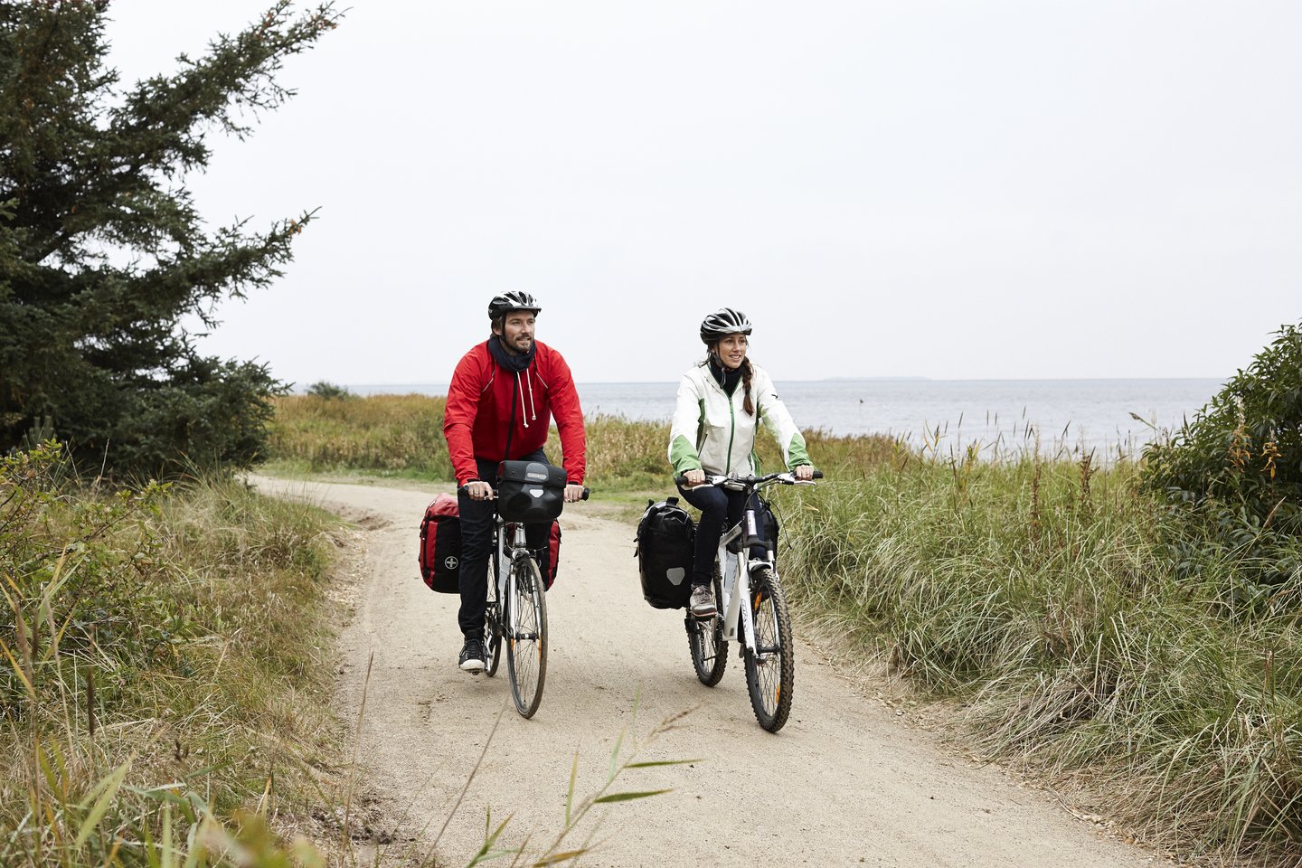 Couple cycling on the West coast cycling route (N1)