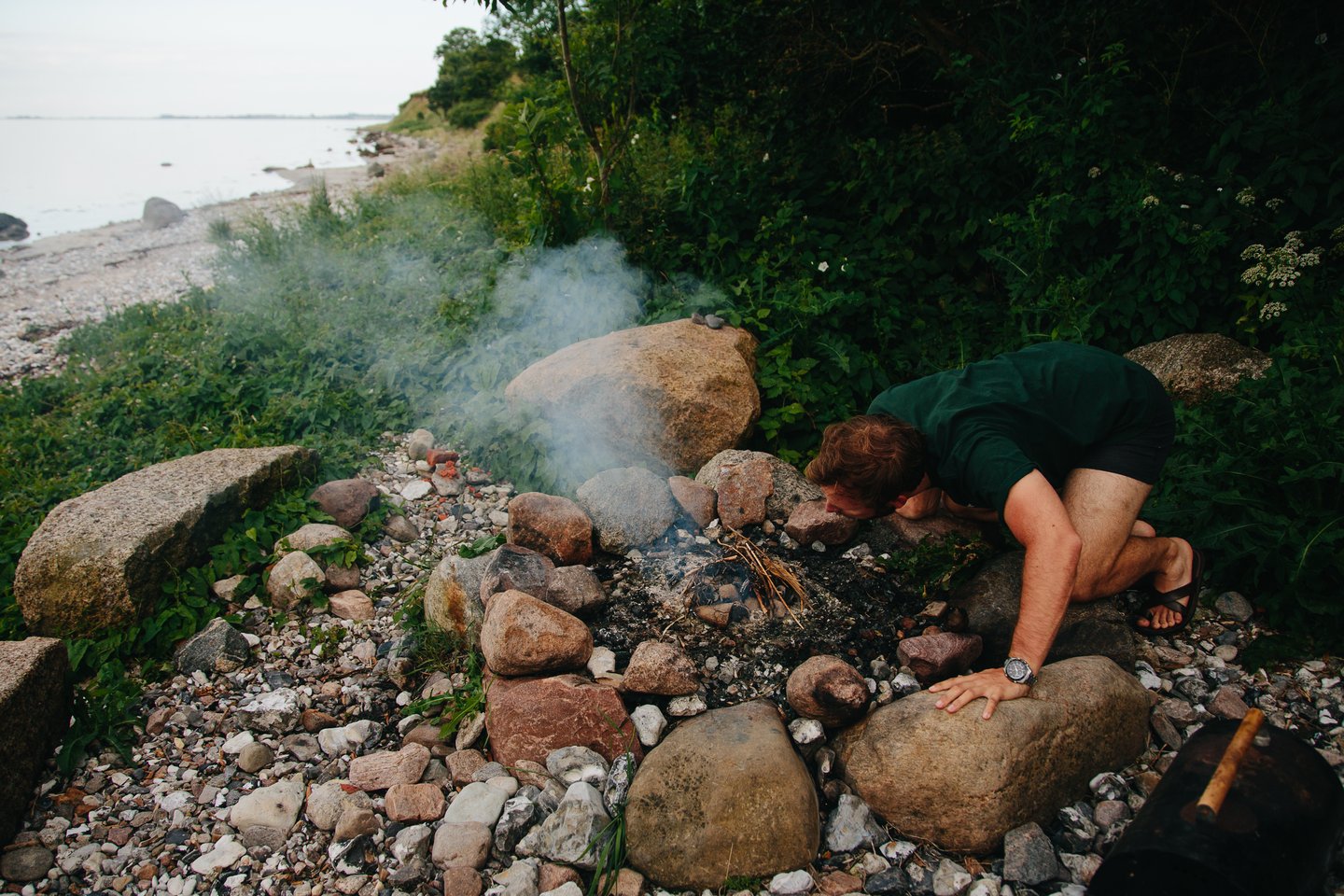 A man trying to start a bonfire - Nederste Skovbymark