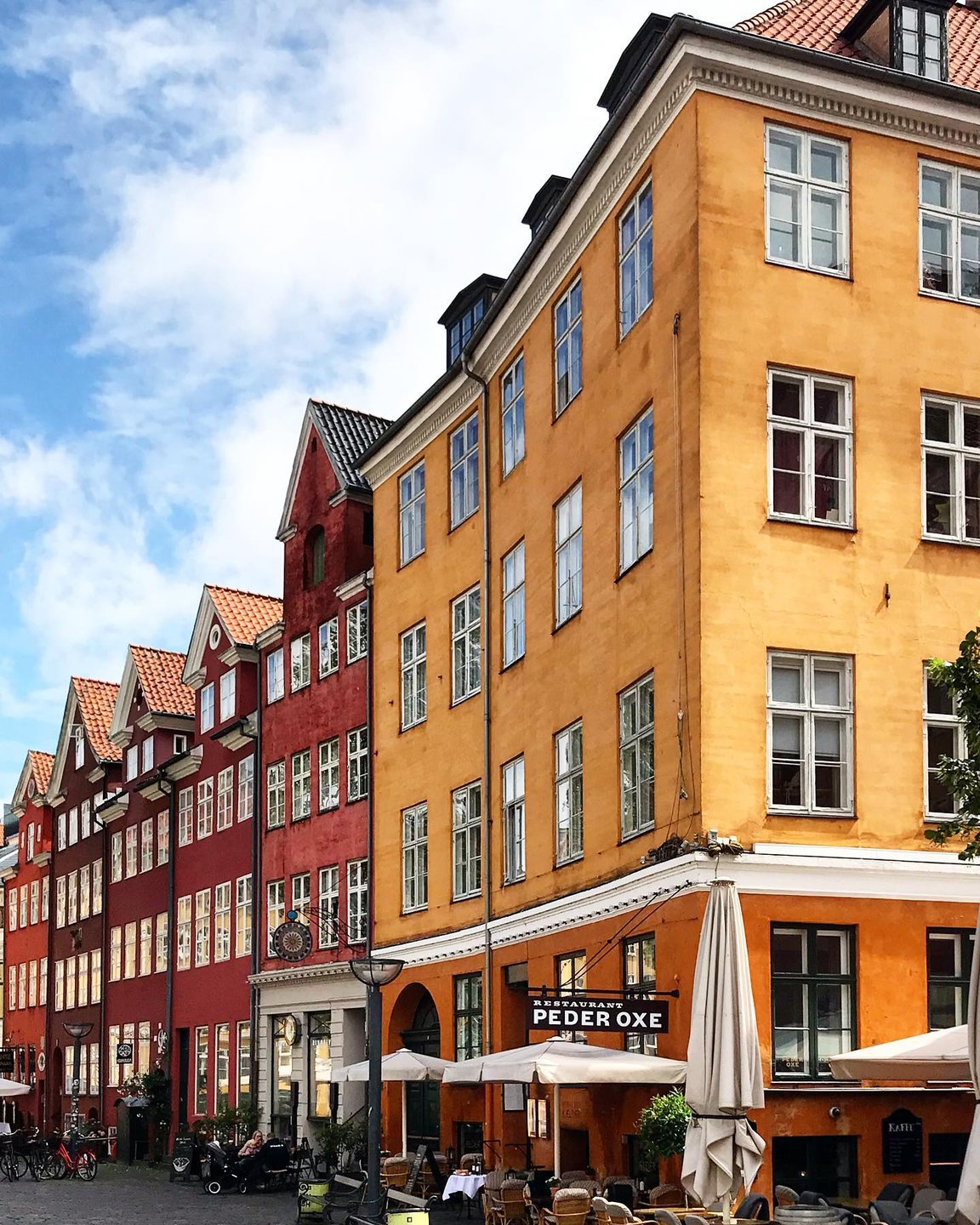 The buildings at Gråbrødretorv in Copenhagen are known for their orange hue.