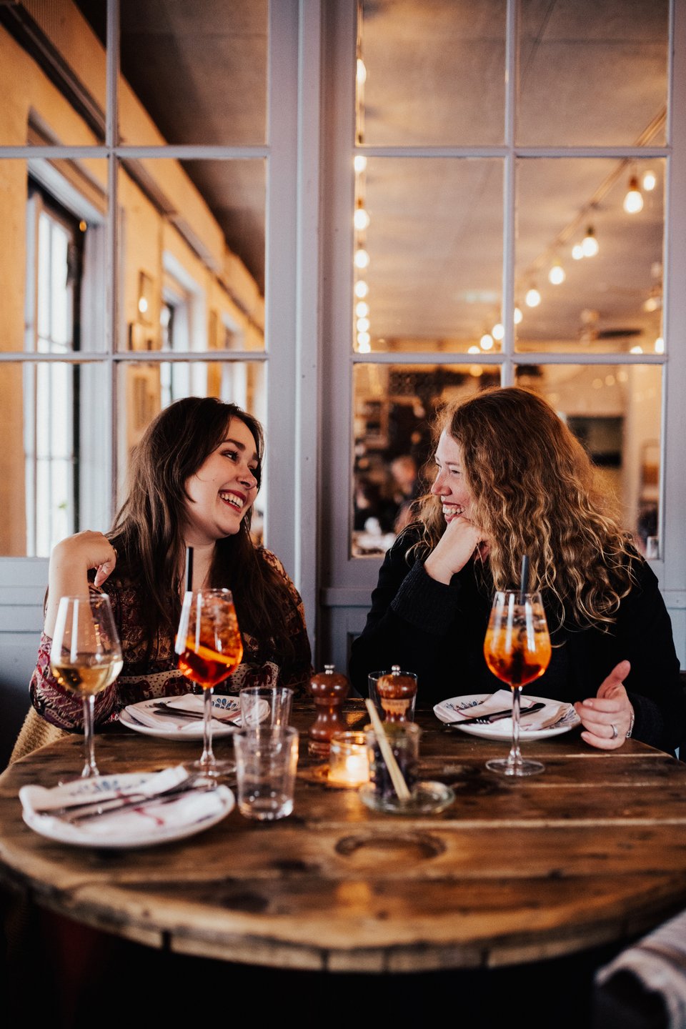 Two women eating dinner at Undici, a restaurant in the neighbourhood Christianshavn in Copenhagen, Denmark