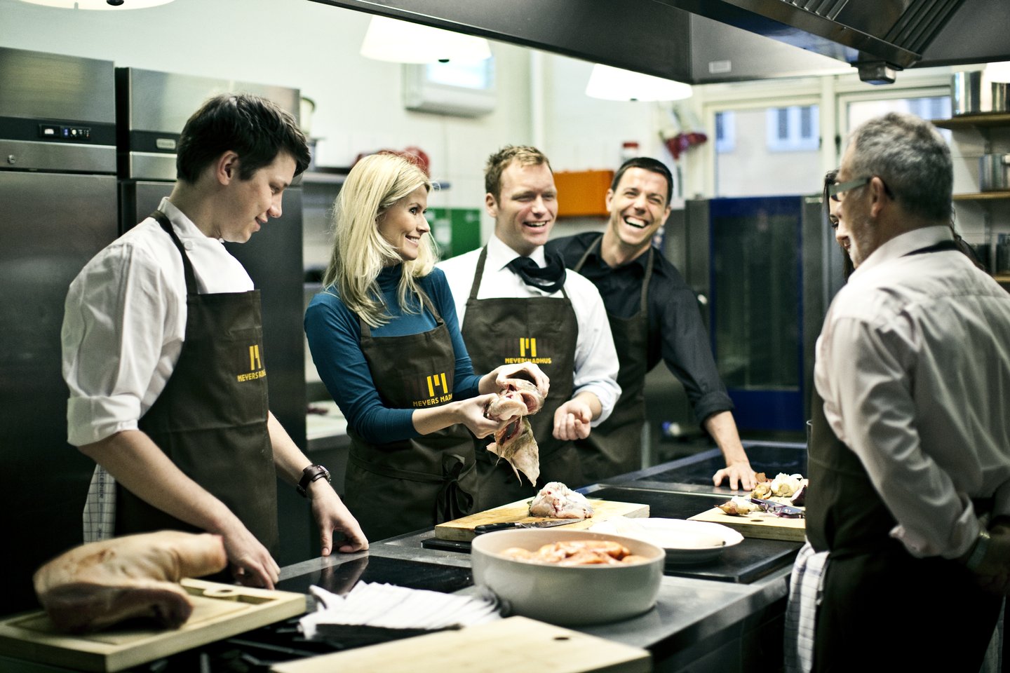 Four colleagues attend a cooking class in Denmark
