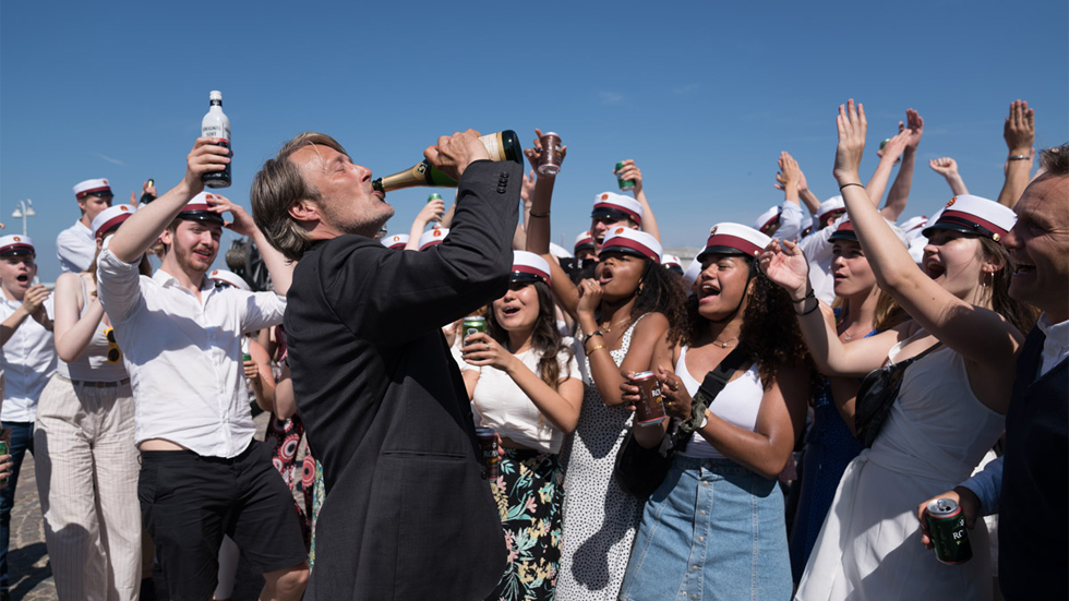 Mads Mikkelsen drinks Champagne in Druk, a Danish film shot in Copenhagen, Denmark