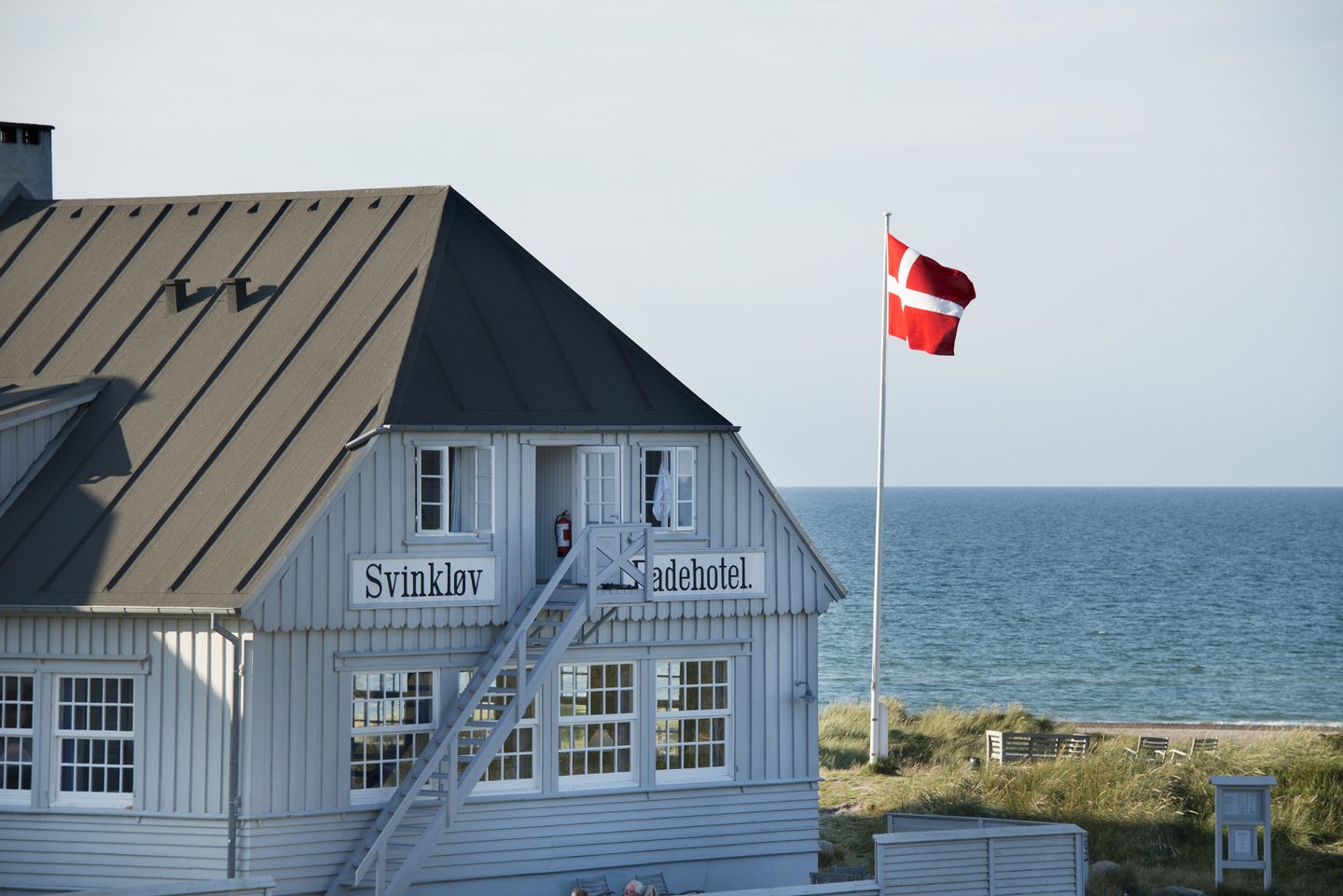 The outside of Svinkløv Badehotel, a beachside spa hotel in Denmark