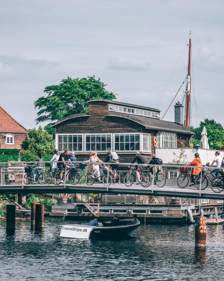 Cyclists crossing a bridge in Copenhagen