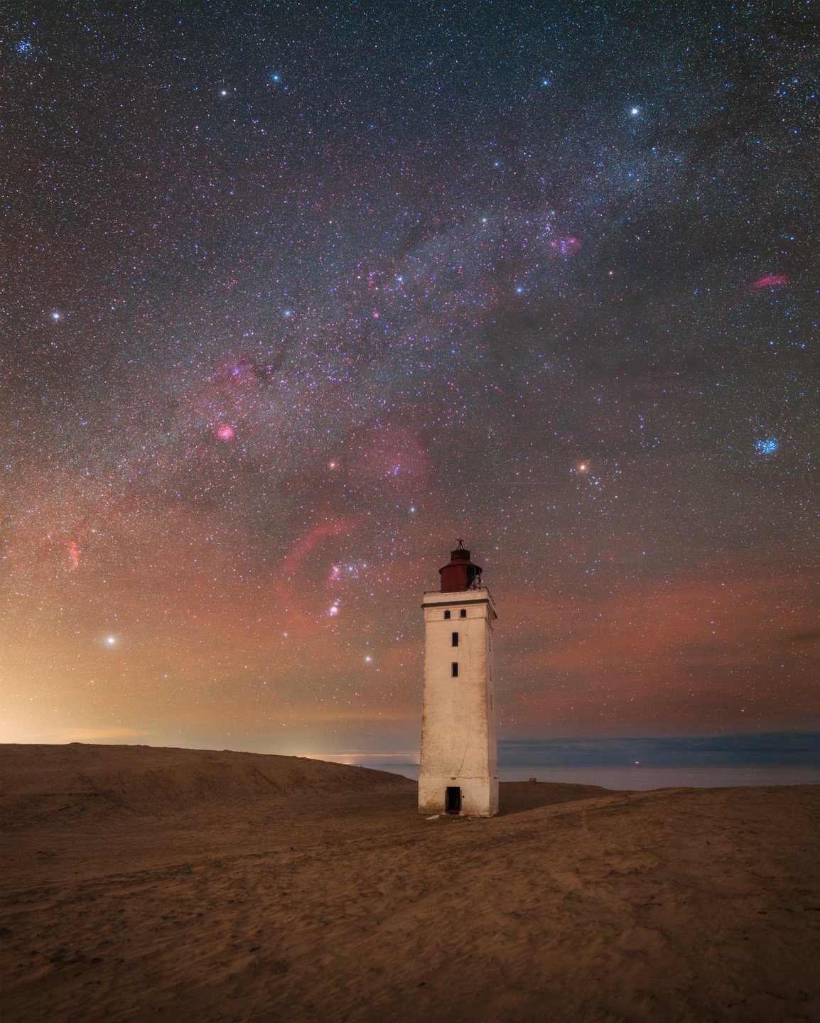 Night sky over Rubjerg Knude lighthouse, North Jutland