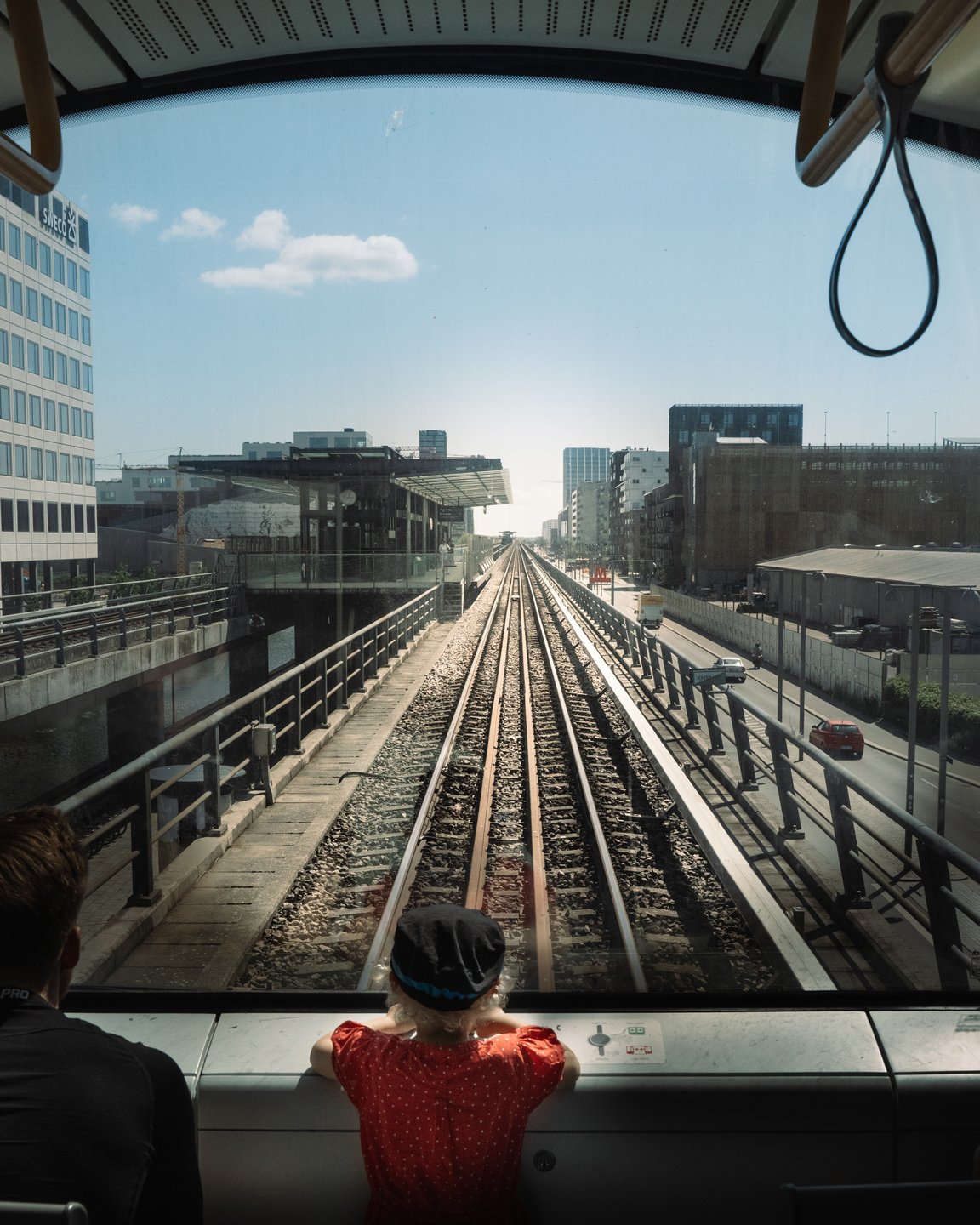Child in front of driver-less Copenhagen Metro, Denmark