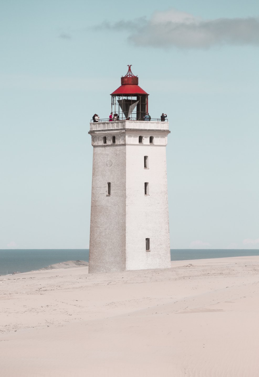 Rubjerg Knude Lighthouse in front of blue sky, North Jutland in Denmark