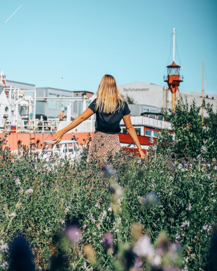 Woman wandering at Reffen street food market in Copenhagen