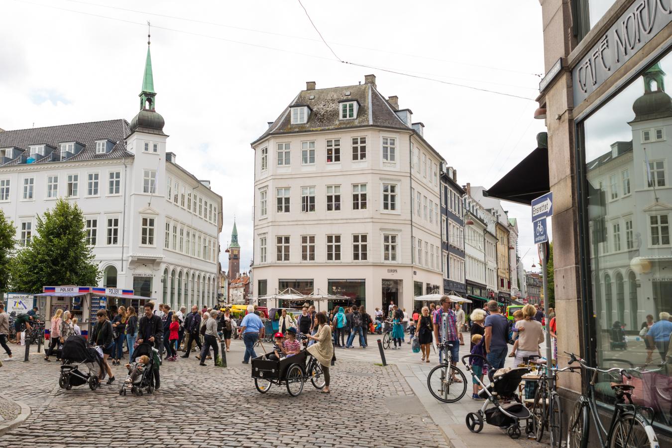 People outside on Højbro Plads in Copenhagen, Denmark