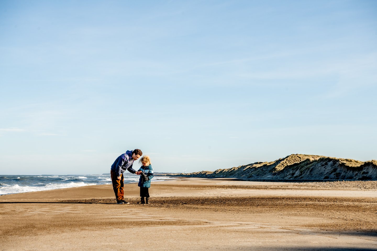Family on the beach in Klitmøller, North Jutland
