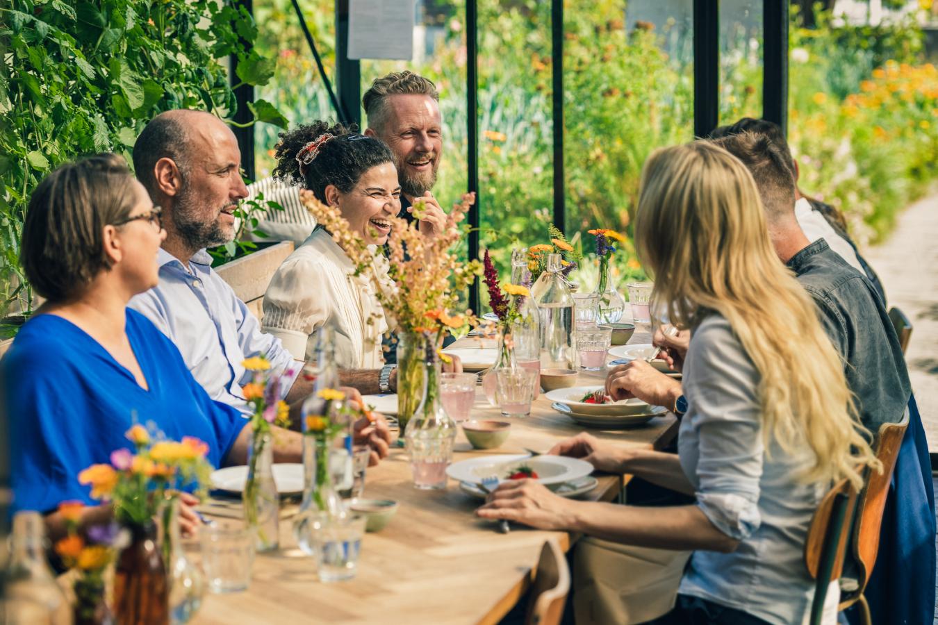 Group of people eating at Gro Spiseri /Østergro in Copenhagen