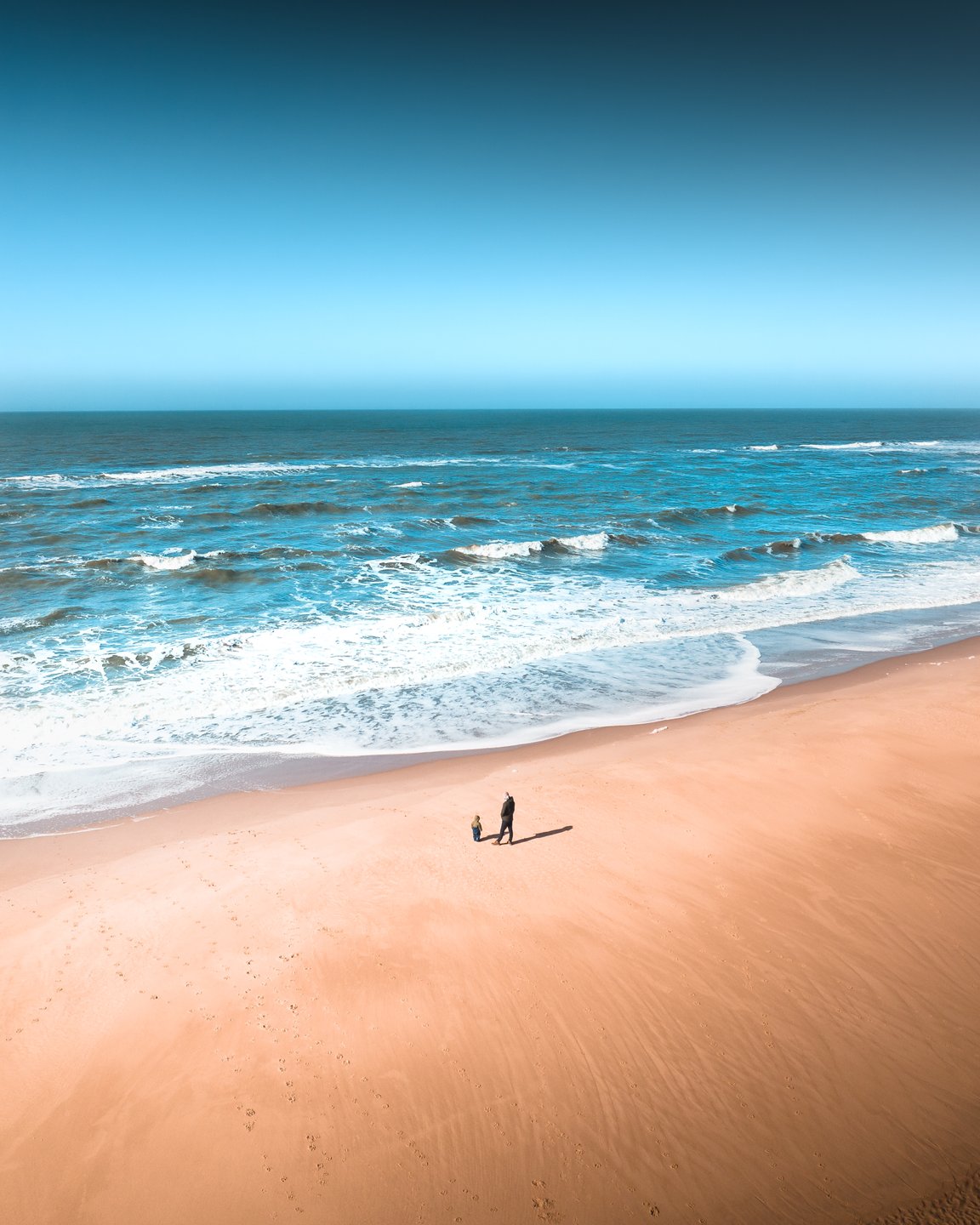 People on Lyngvig Beach West Jutland