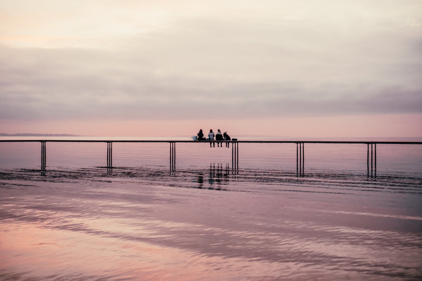 People sitting on the Infinity bridge