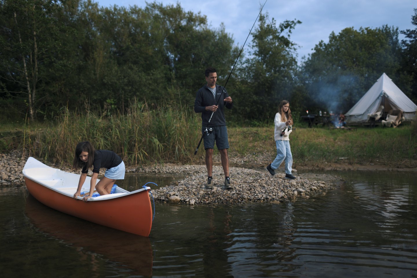 Family camping outdoors