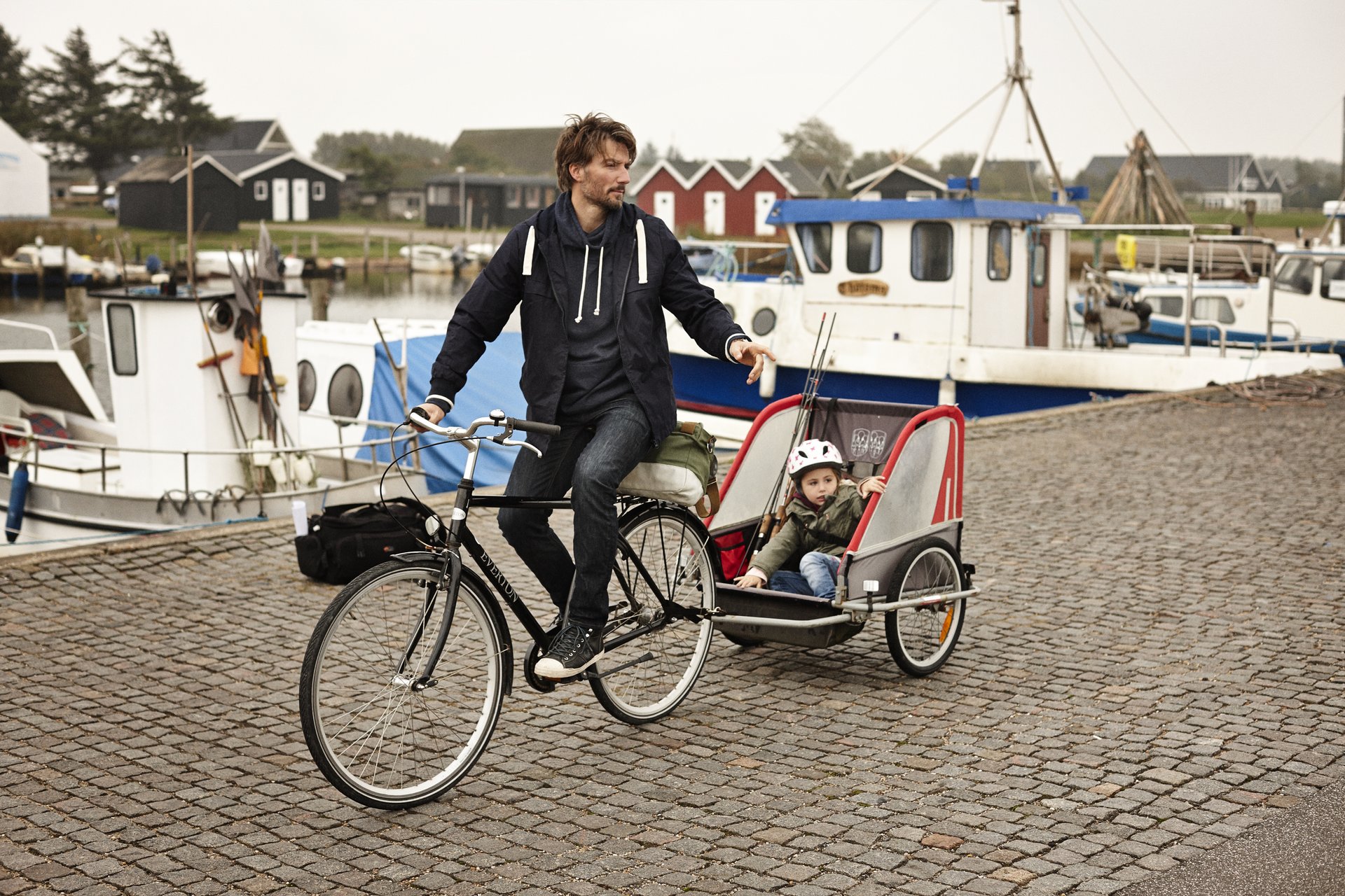 Father with kid on a bike in Bork Havn
