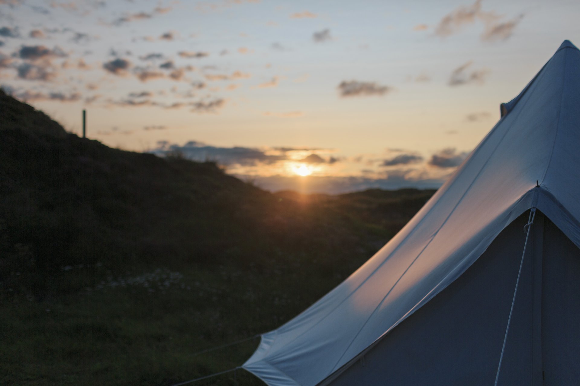 Glampingtent in the dunes at sunset on the Danish westcoast