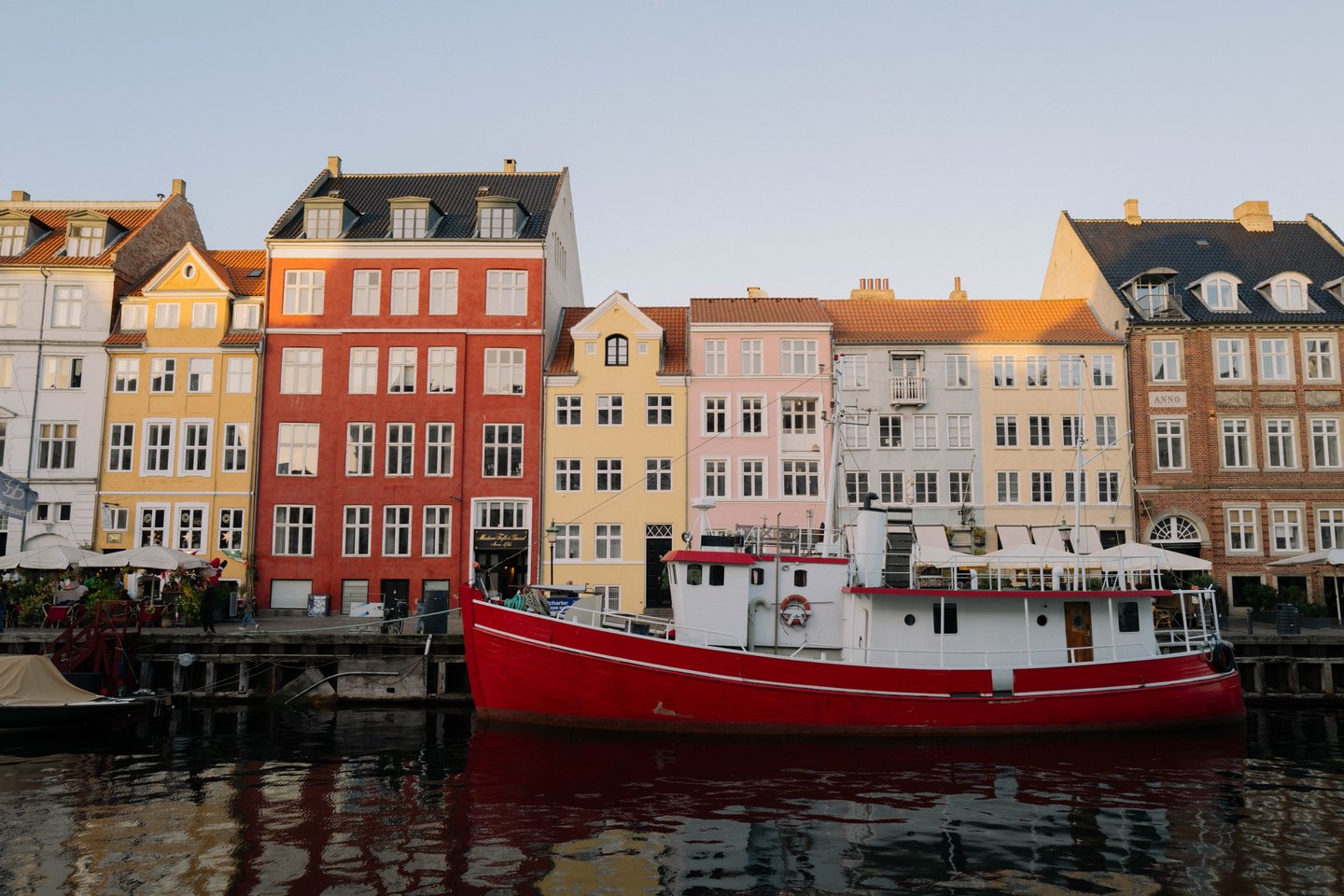 Boats and houses in Nyhavn in Copenhagen in autumn
