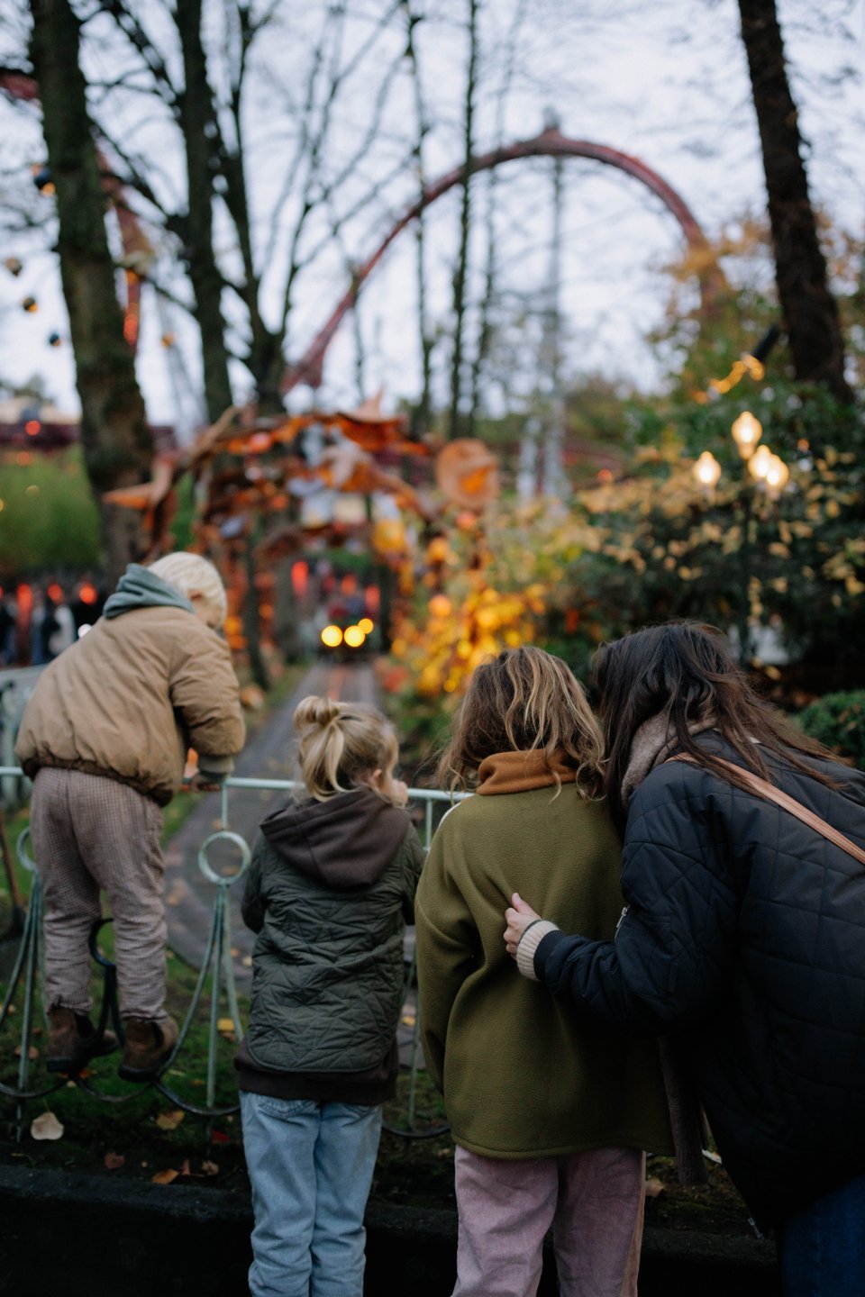 Family at Tivoli Gardens in central Copenhagen in autumn