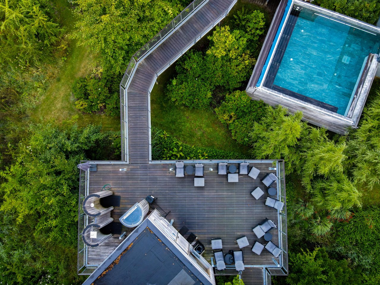 View of hotel with outdoor spa 