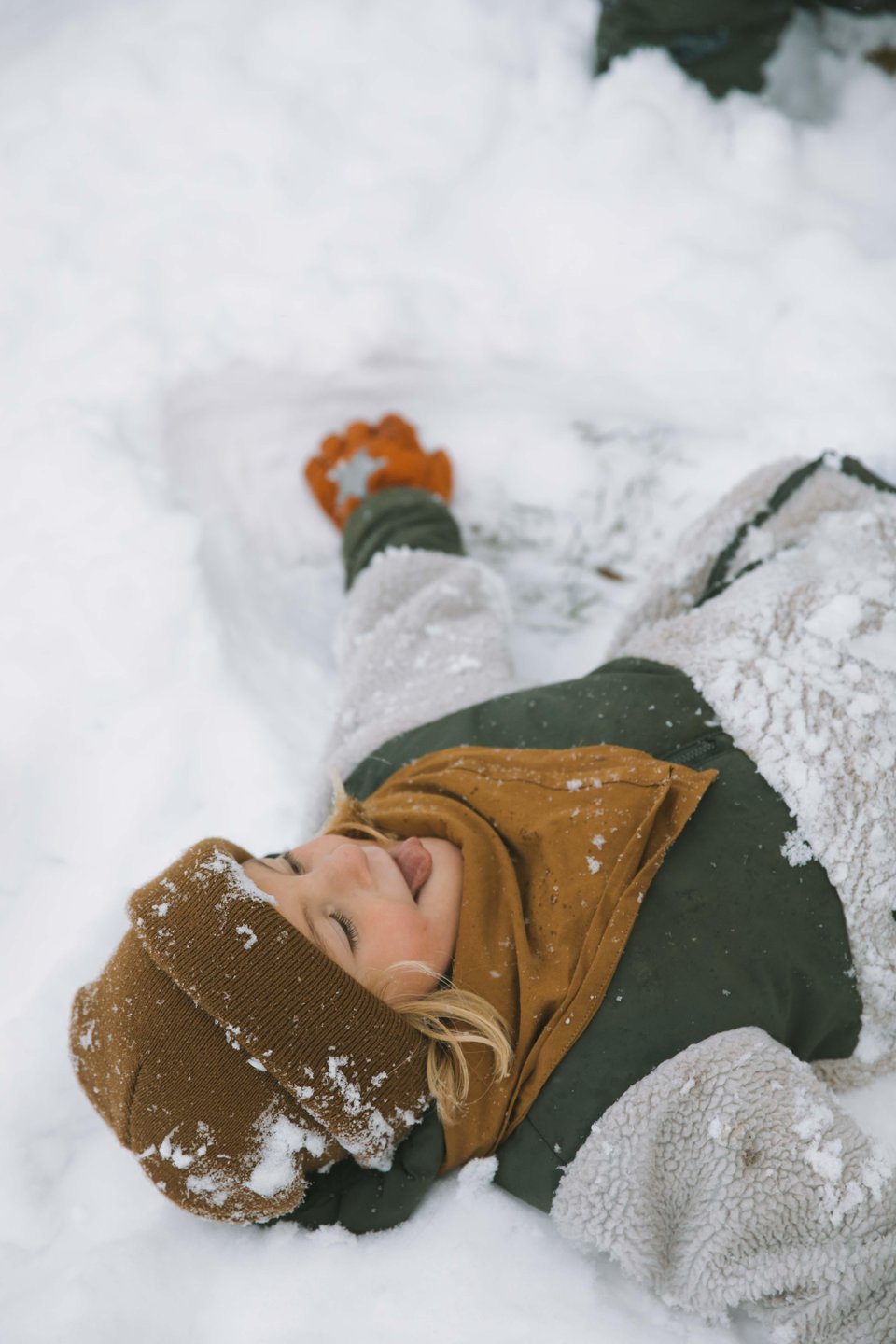 Girl playing in snow