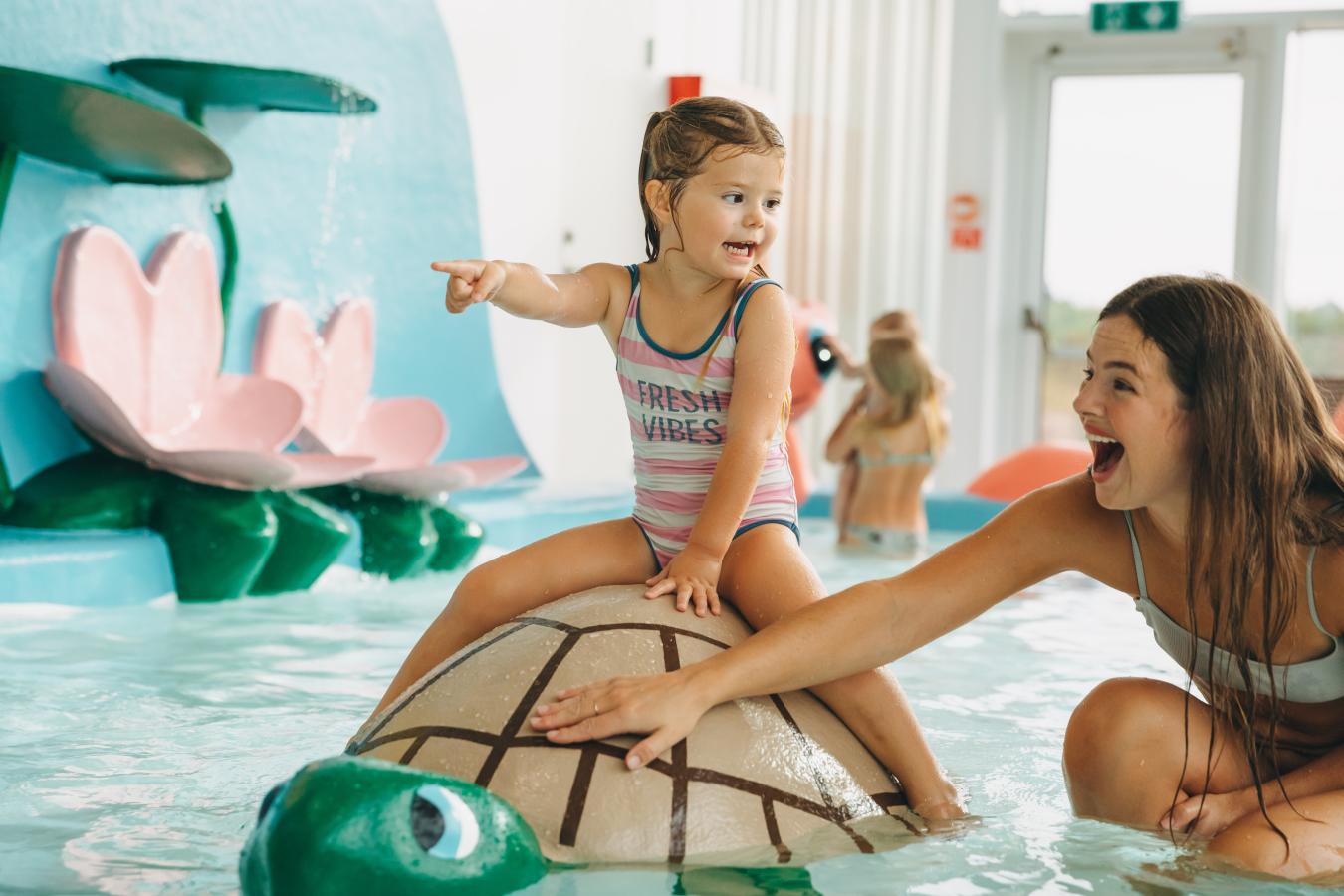 Mother and child in aquapark at Skallerup Seaside Resort