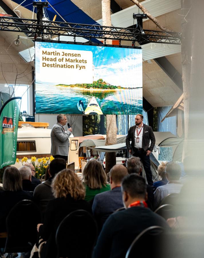 Martin Jensen fra Destination Fyn og Markus Diefenbach fra VisitDenmark taler på Campingdagen 2026 
