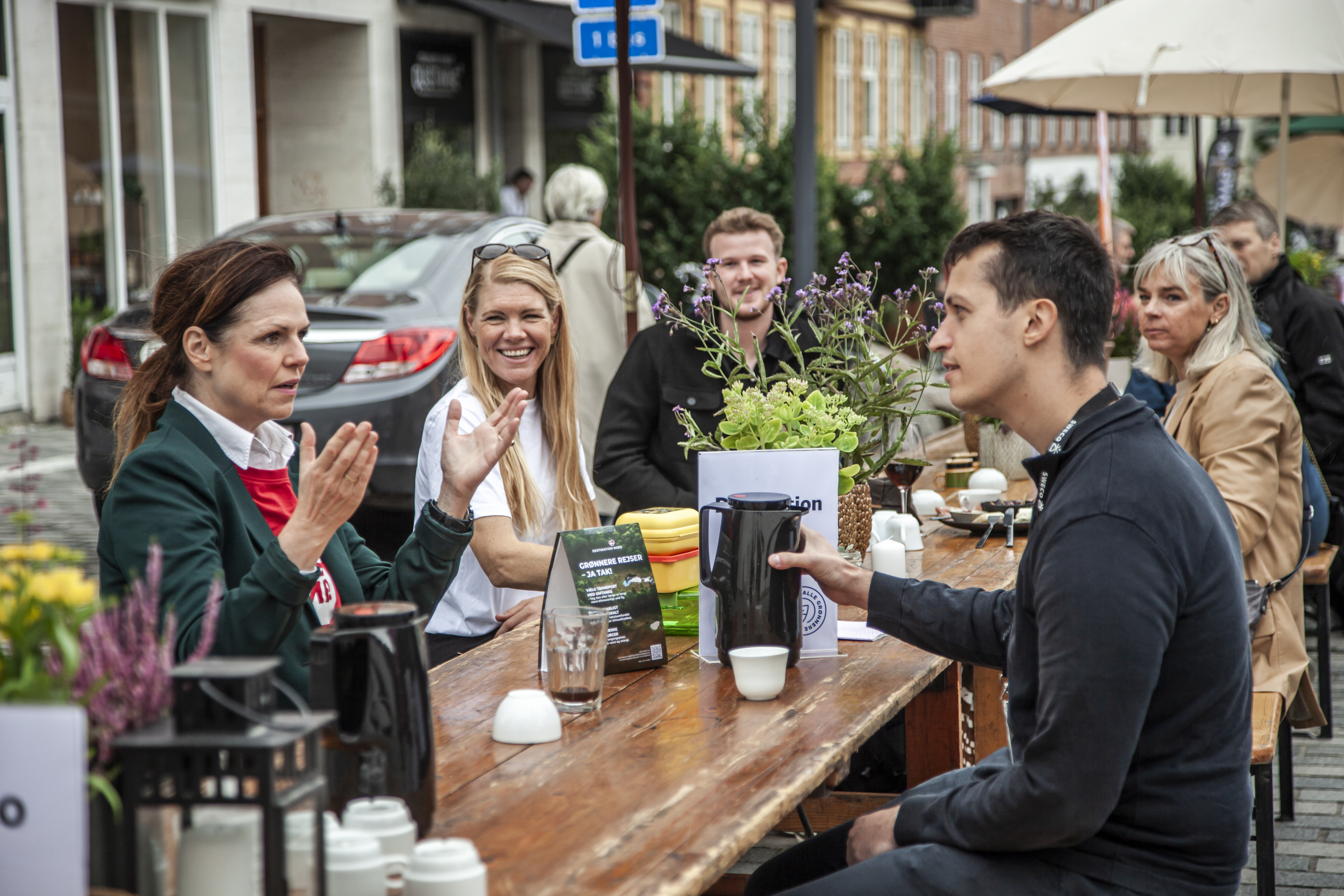 Group of people in a social dining setting