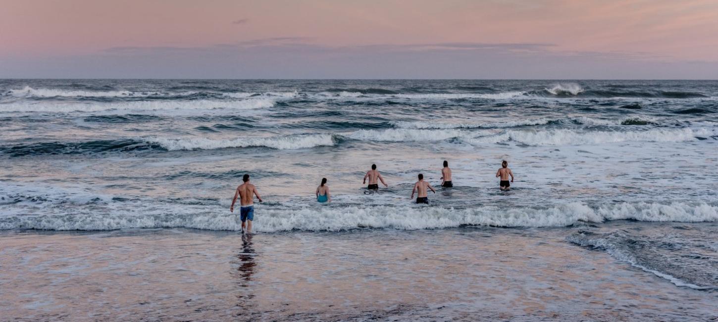 Winter bathers going into the water on a winter morning in Klitmoeller in North Jutland. 