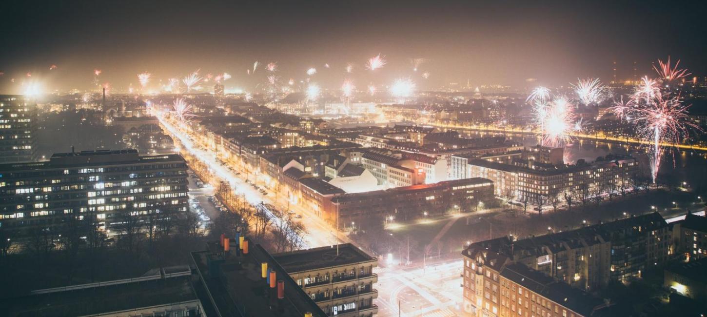 Fireworks going off all over central Copenhagen, Denmark, during New Year’s Eve