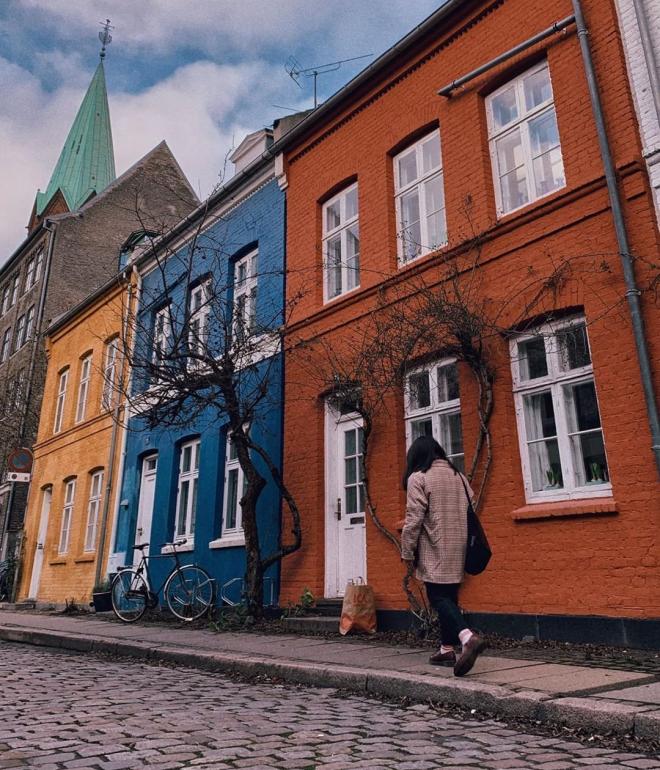 The colourful houses in Krusemyntegade are located in the heart of Copenhagen close to the King's Garden.