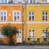 Bikes in front of colourful houses on Østerbro, Copenhagen