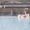 A lady relaxes in the spa kurbadet by Ilse Jacobsen in Hornbæk, North Zealand, Denmark
