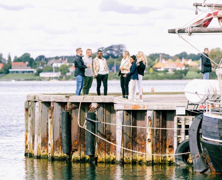 People Standing on Dock in Trekantomraadet, Jutland, Denmark
